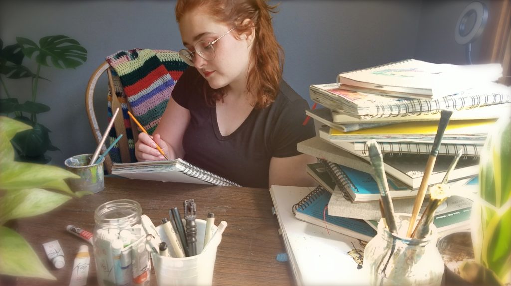Maxine in her studio, sketching as usual